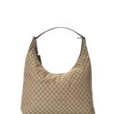 A PAIR OF BROWN MONOGRAM CANVAS OVERSIZED HOBO BAGS - Foto 7