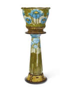 Majolique. AN ASSEMBLED MINTONS 'SECESSIONIST' GLAZED EARTHENWARE JARDINIERE AND PEDESTAL