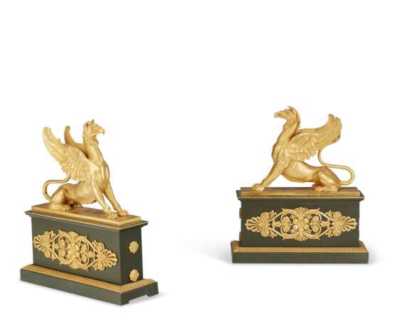 A PAIR OF FRENCH ORMOLU AND PATINATED-BRONZE CHENETS - photo 1