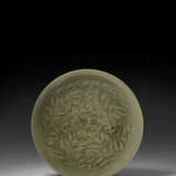 A MOLDED YAOZHOU CELADON `FISH AND WATER WEEDS’ BOWL - photo 1
