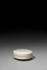 A SMALL GLAZED WHITE PORCELAIN BOX AND COVER