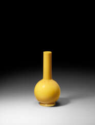 AN IMPERIAL YELLOW GLASS BOTTLE VASE