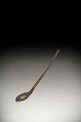 A RARE CRYSTAL-INLAID RED AND BLACK LACQUERED RITUAL SPOON, BI