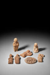 A GROUP OF SEVEN MINIATURE POTTERY FIGURES