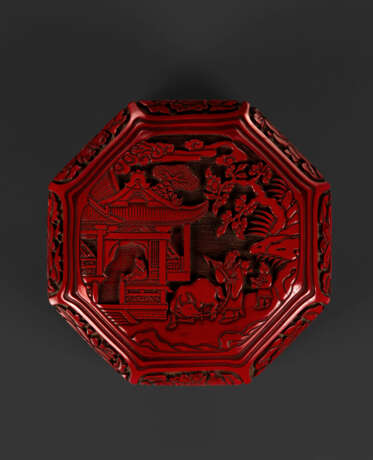 A CARVED RED LACQUER OCTAGONAL FOUR-TIERED BOX AND COVER - photo 3