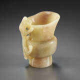 A SMALL YELLOW AND BEIGE JADE VESSEL WITH CHILONG - photo 3