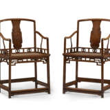 AN UNUSUAL AND RARE PAIR OF HUANGHUALI LOW-BACK ARMCHAIRS - photo 1