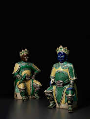 A RARE PAIR OF LARGE FAMILLE VERTE BISCUIT GUARDIAN FIGURES
