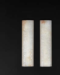 A PAIR OF CARVED WHITE JADE &#39;DAOIST EMBLEMS&#39; WRIST RESTS