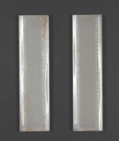 A PAIR OF CARVED WHITE JADE `DAOIST EMBLEMS` WRIST RESTS - photo 2