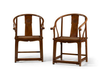 A PAIR OF HUANGHUALI HORSESHOE-BACK ARMCHAIRS