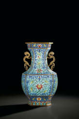 A CLOISONN&#201; ENAMEL FACETED PEAR-SHAPED VASE