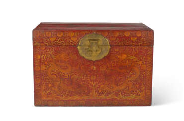 A LARGE GILT-DECORATED RED LACQUERED CHEST