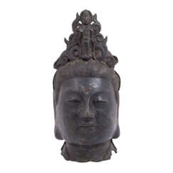 Survivor-sized head of Guanyin made of bronze. CHINA, Qing Dynasty (1644-1912).