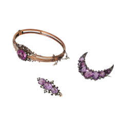 Mix of antique jewelry with purple stones,