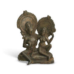 A BRONZE GROUP OF SHIVA AND PARVATI