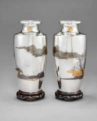 A PAIR OF SILVER PRESENTATION VASES