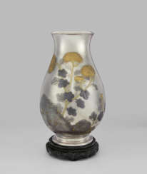 A LARGE SOFT-METAL INLAID SILVER FLOWER VASE