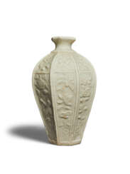 A MOLDED QINGBAI OCTAGONAL VASE