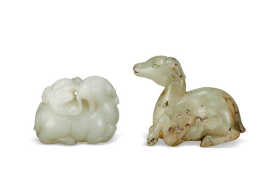 A WHITE JADE CARVING OF A RAM AND A GREENISH-BEIGE JADE CARVING OF A GOAT - photo 1