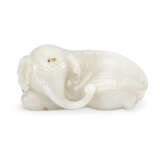 A WHITE JADE FIGURE OF A RECUMBENT ELEPHANT - photo 1