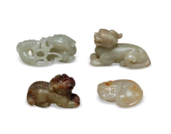 FOUR JADE CARVINGS OF MYTHICAL BEASTS - photo 1