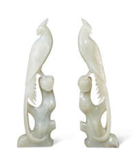 A PAIR OF GREENISH-WHITE JADE CARVINGS OF BIRDS