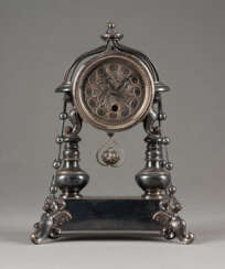 A METAL TABLE CLOCK Poland, late 19th century Marked wit