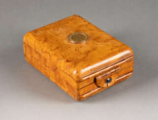 A BIRCH WOOD CASE WITH GOLD ROUBLE Russian, circa 1900 O