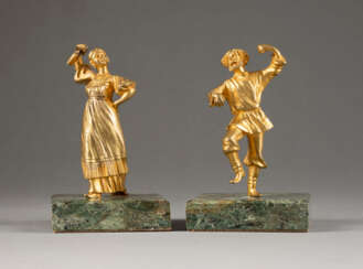 A PAIR OF BRONZE FIGURES SHOWING A DANCING PEASANT COUPL