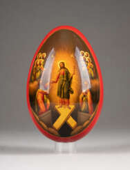 A LARGE PAPIER-MACHÉ AND LACQUER EASTER EGG SHOWING THE