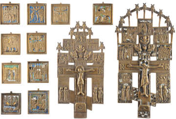 TWO CRUCIFIXES AND TEN BRASS ICONS SHOWING THE MAIN FEAS