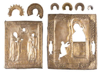 TWO BRASS OKLADS OF ICONS SHOWING THE MOTHER OF GOD 'OF