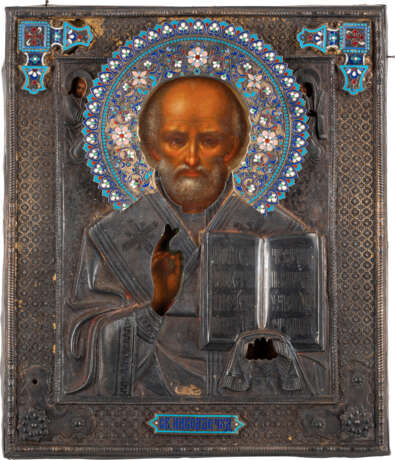 A SIGNED ICON SHOWING ST. NICHOLAS OF MYRA WITH A SILVER-GI - фото 1