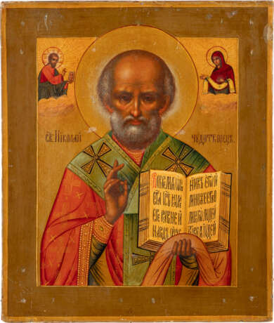 A SIGNED ICON SHOWING ST. NICHOLAS OF MYRA WITH A SILVER-GI - фото 2