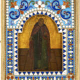 A SMALL ICON SHOWING A MONCH WITH A SILVER-GILT AND CLOISON - фото 1
