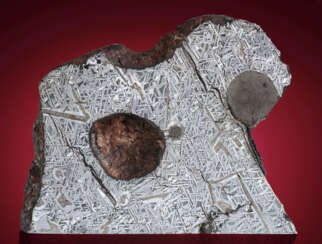 TAMBO QUEMADO — PARTIAL SLICE OF A STORIED IRON METEORITE, ETCHED ON BOTH SIDES 