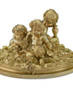 Andre Aucoc. A FRENCH SILVER-GILT FIGURAL GROUP OF THREE PUTTI