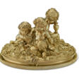A FRENCH SILVER-GILT FIGURAL GROUP OF THREE PUTTI - Auktionsarchiv