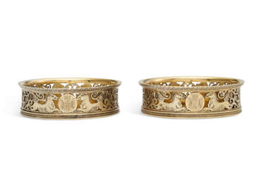 THE BORGHESE SERVICE: A PAIR OF ITALIAN SILVER-GILT WINE COASTERS