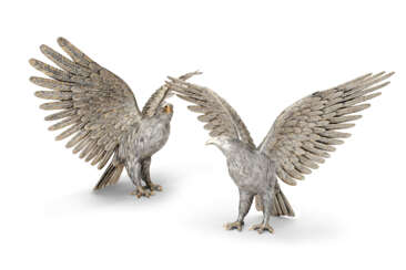 A PAIR OF ITALIAN PARCEL-GILT SILVER MODELS OF EAGLES