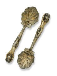 A PAIR OF REGENCY SILVER-GILT BERRY SPOONS