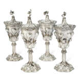 A SUITE OF FOUR MATCHING GERMAN SILVER CUPS AND COVERS - photo 1