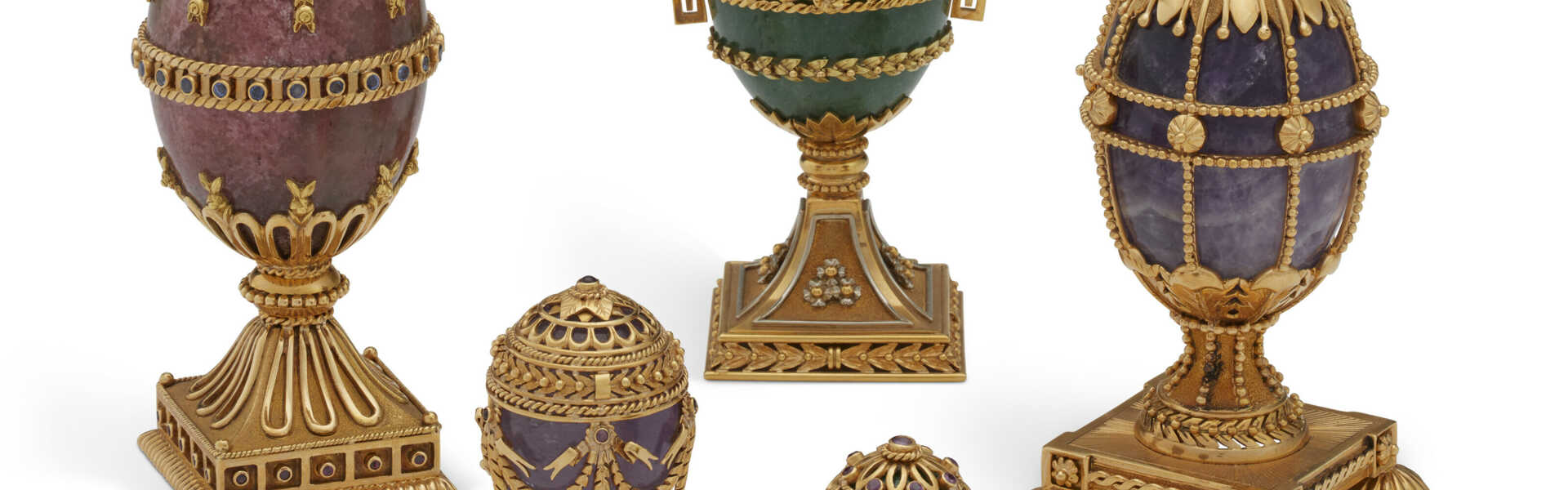 A GROUP OF FIVE GREEK GOLD AND GEM-MOUNTED HARDSTONE EGGS