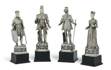 A SET OF FOUR GERMAN SILVER FIGURAL TABLE ORNAMENTS