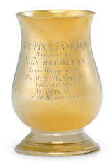 AN ELIZABETH II 9K GOLD TROPHY MUG