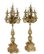 Periode von Louis-Philippe I.. A LARGE PAIR OF FRENCH ORMOLU NINE-LIGHT CANDELABRA