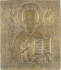 A LARGE BRASS ICON SHOWING ST. NICHOLAS OF MYRA Russian,