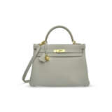 A GRIS PERLE TOGO LEATHER RETOURNÉ KELLY 32 WITH GOLD HARDWARE - photo 1