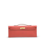 Clutch. A CAPUCINE EPSOM LEATHER KELLY CUT WITH GOLD HARDWARE